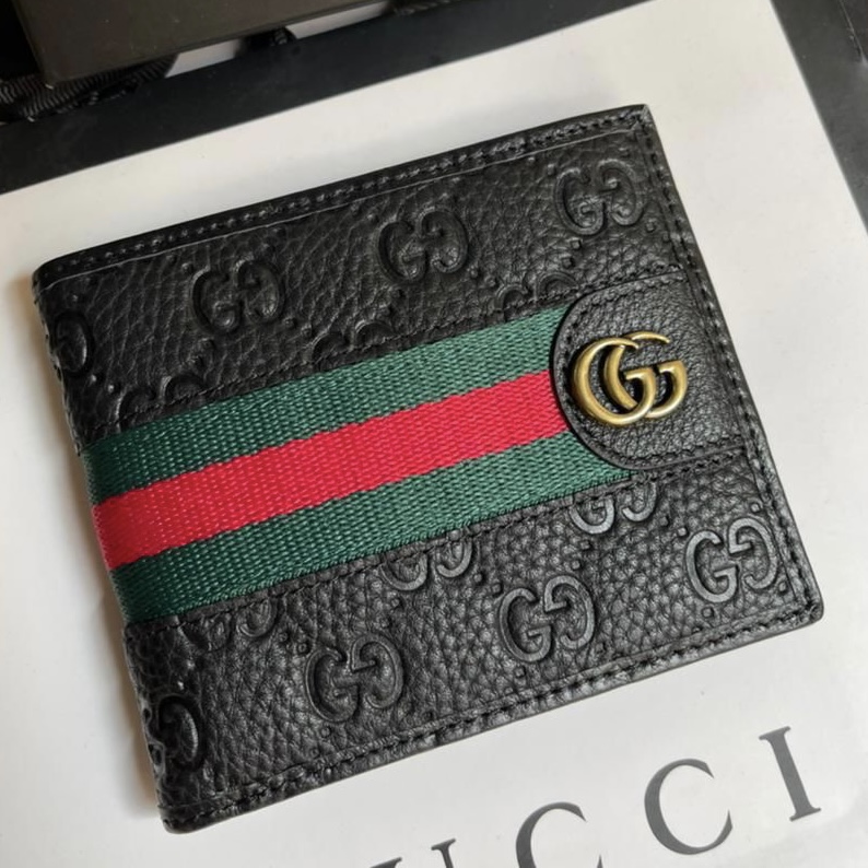Gucci Iconic Reverse GG Embossed Wallet