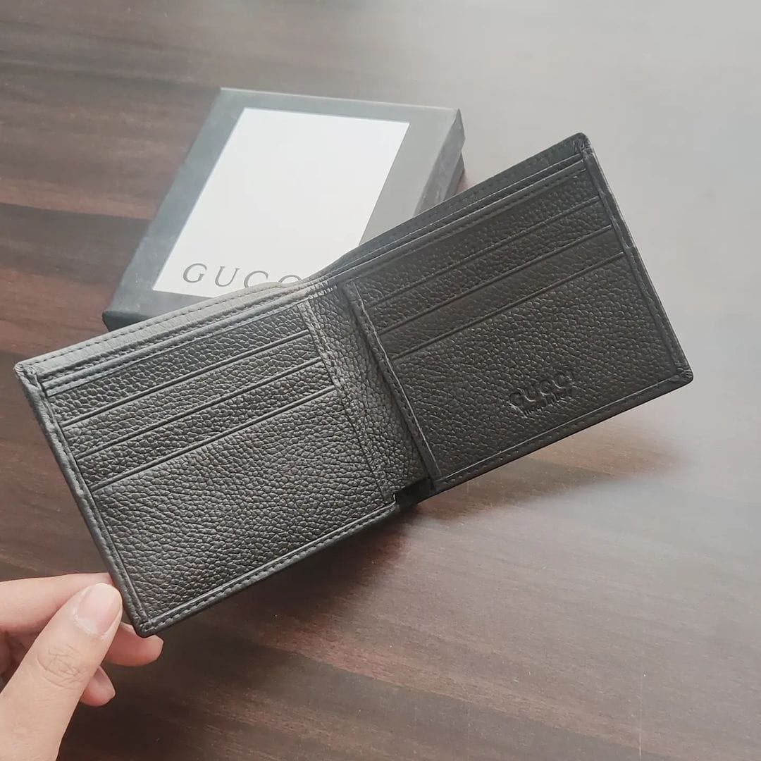 Gucci Iconic Reverse GG Embossed Wallet