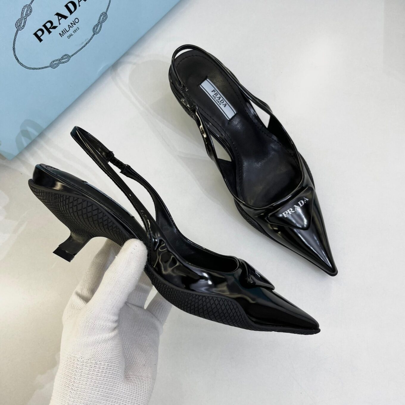 WhatsApp Image 2025-08-04 at 2.28.36 PM (1) Prada Patent Black Slingback Pump