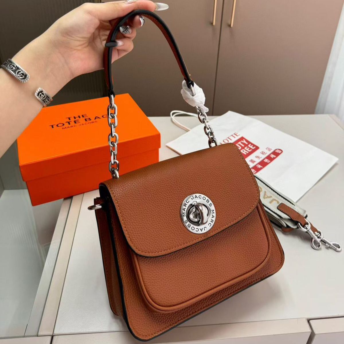 WhatsApp Image 2025-08-07 at 11.23.53 AM Marc Jacobs Turn Lock Satchel Brown Shoulder Bag (With Box)