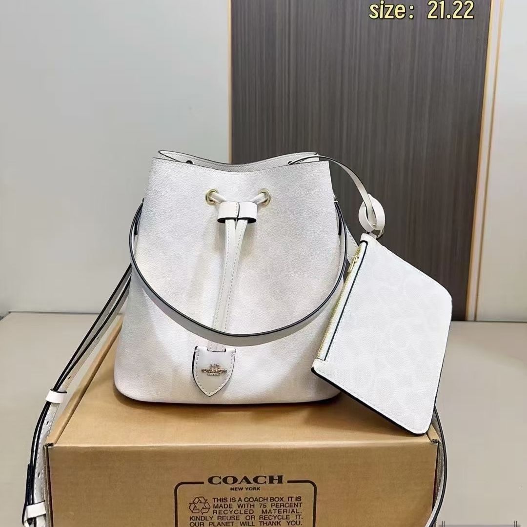 WhatsApp Image 2025-09-17 at 5.13.12 PM Coach Rowan Signature White Bucket Sling Bag (With Box)
