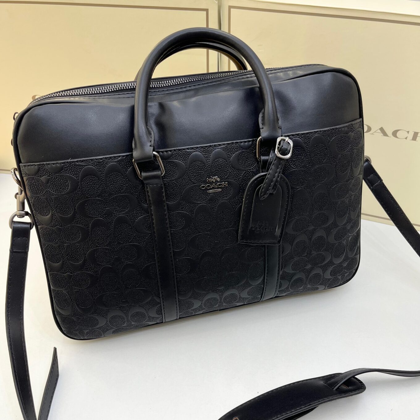 Coach Embossed Laptop Bag