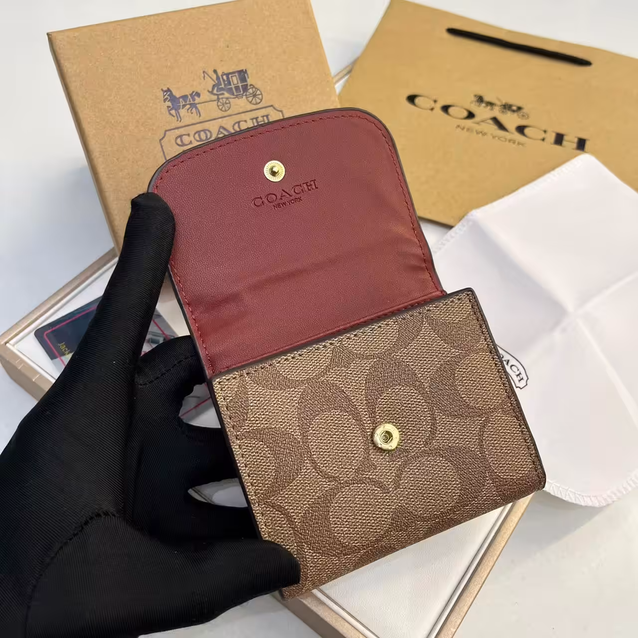 WhatsApp Image 2025-12-02 at 6.44.51 PM (2) Coach three Fold Apricot Rose Pink Wallet