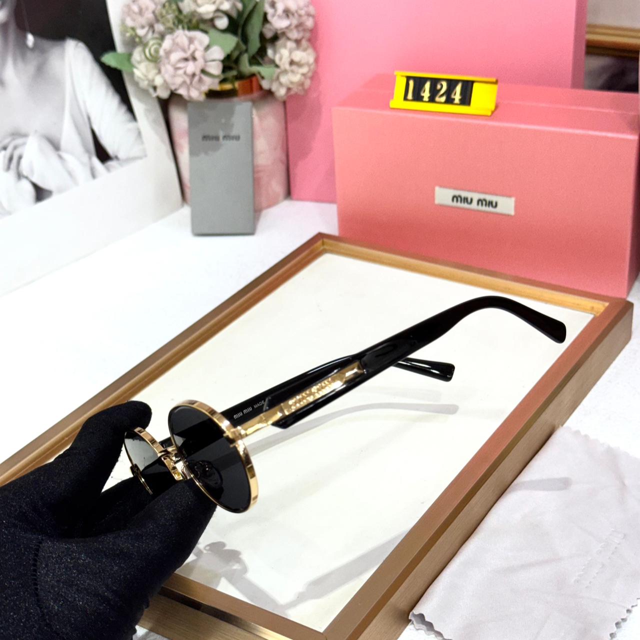 WhatsApp Image 2026-01-09 at 6.55.56 PM (1) Miu Miu Gold Round Sunglasses for Women