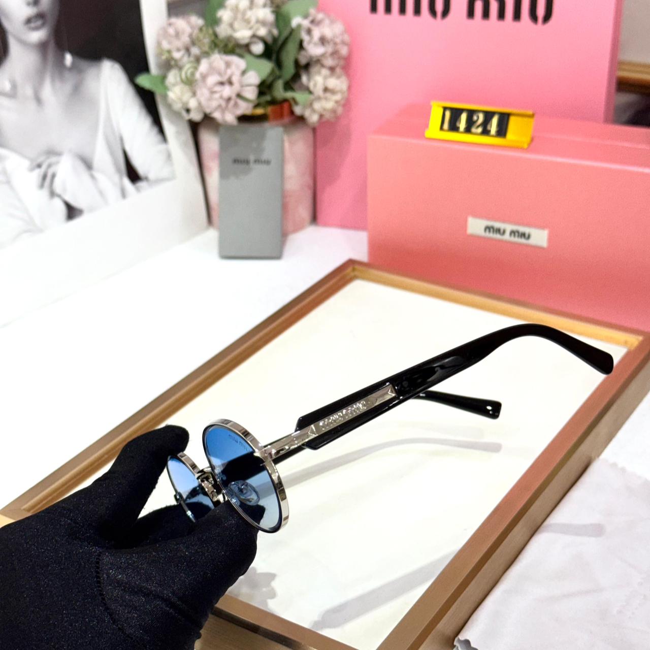 Miu Miu Silver Round Blue Sunglasses for Women